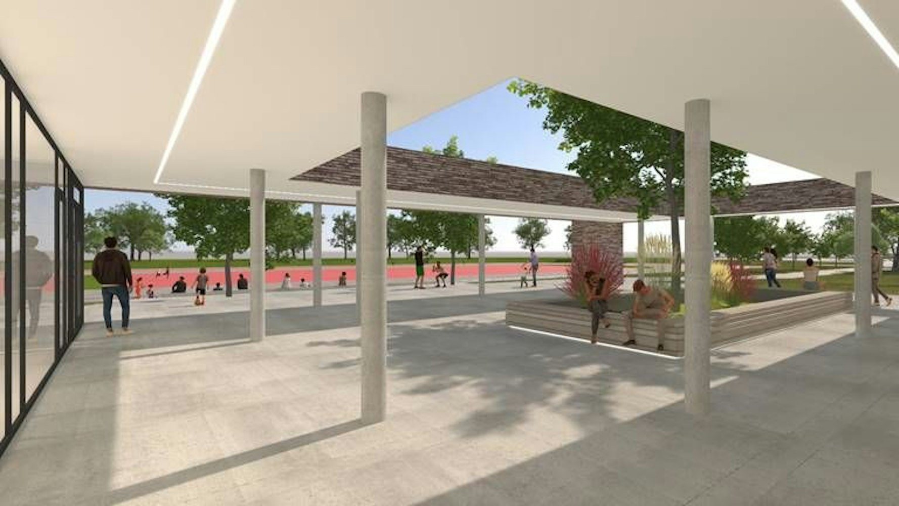 Eine Ansicht des Atriums vor dem Foyer der neuen Doppelsporthalle mit Blick auf den Fußballplatz.