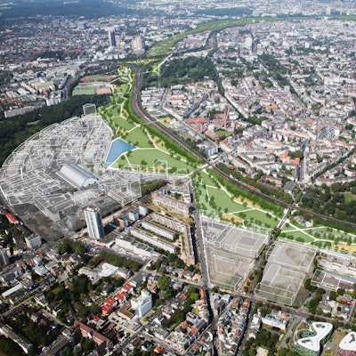 Eine Luftaufnahme von einem Neubaugebiet mit modellierten Gebäuden.