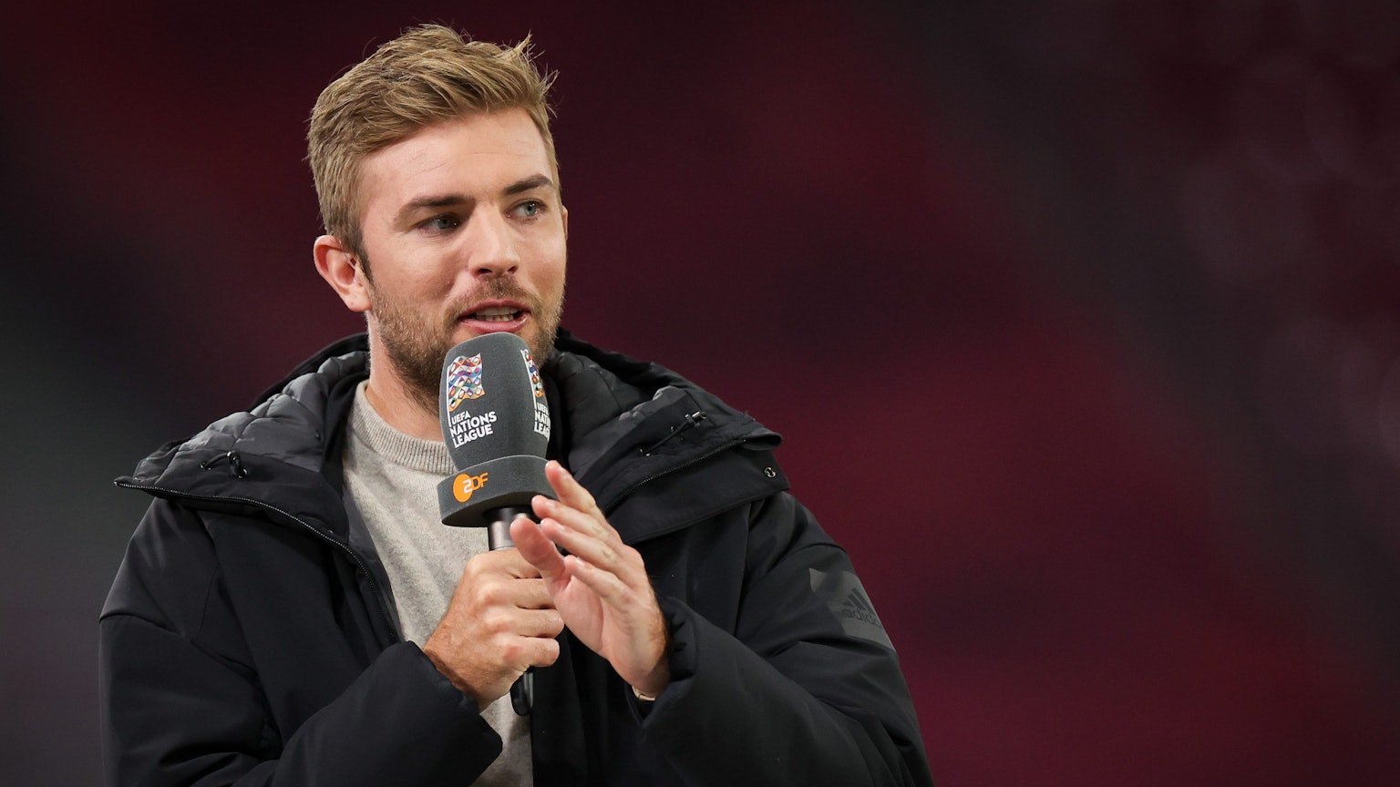Christoph Kramer am Mikrophon