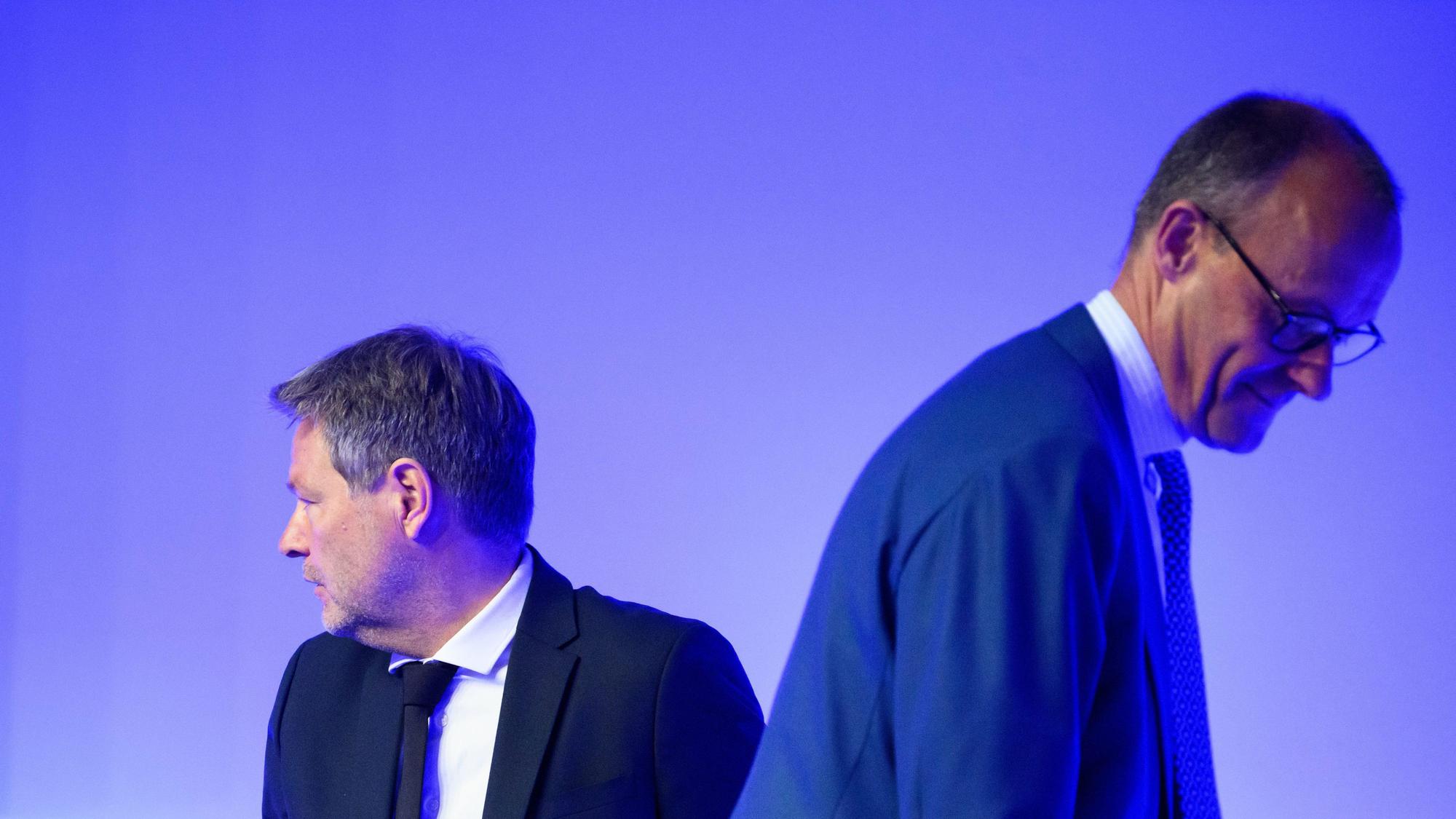 Robert Habeck (l.) und Friedrich Merz