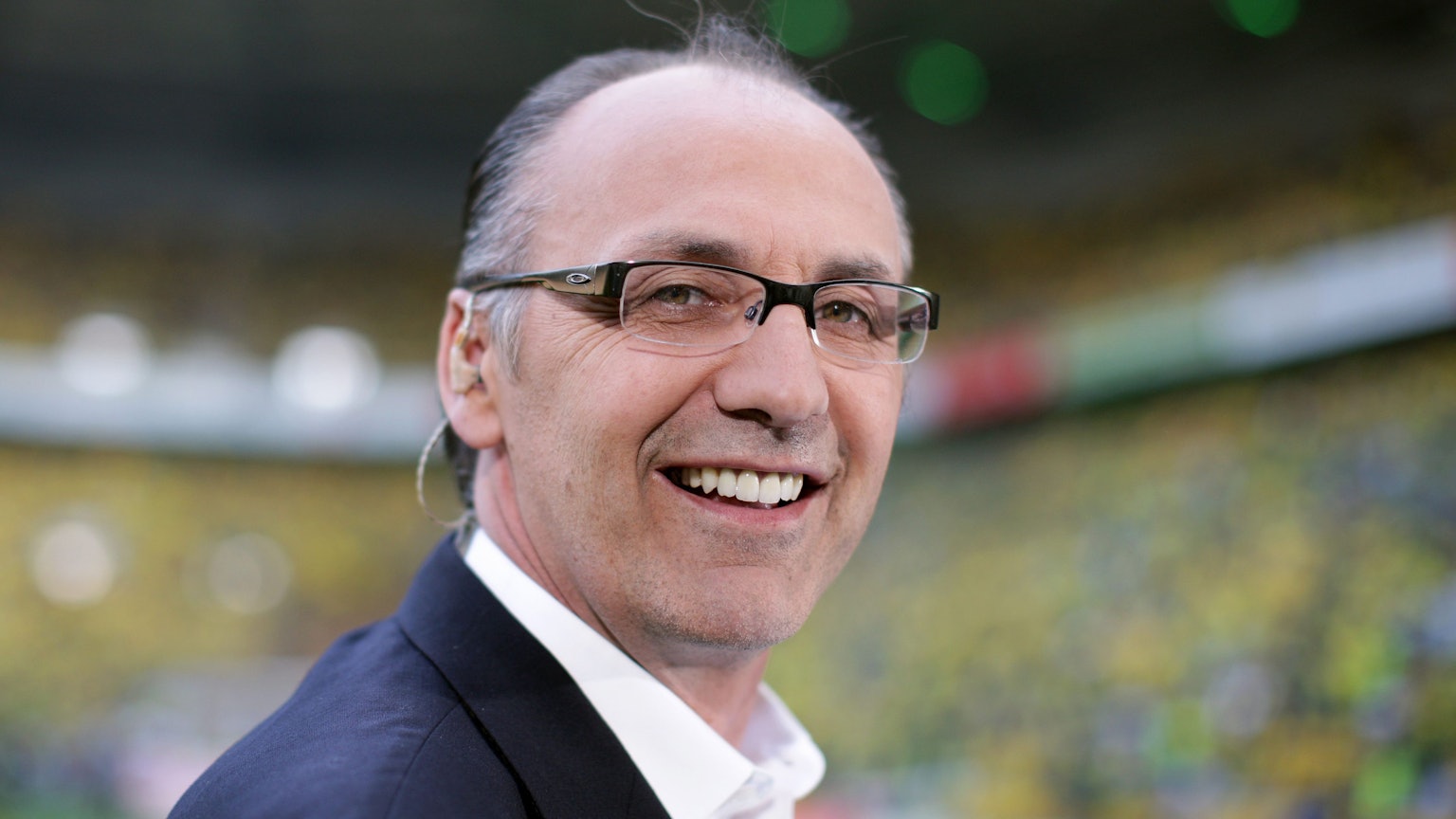 Jürgen Kohler lächelt in die Kamera.