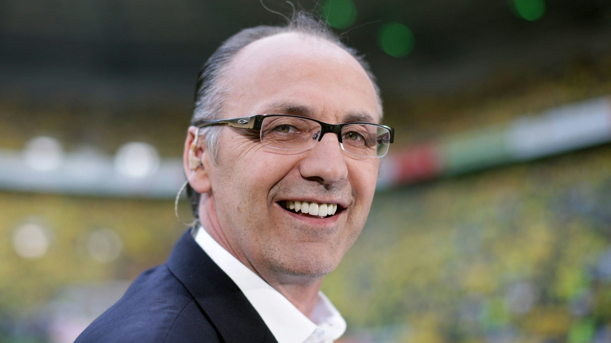 Jürgen Kohler lächelt in die Kamera.