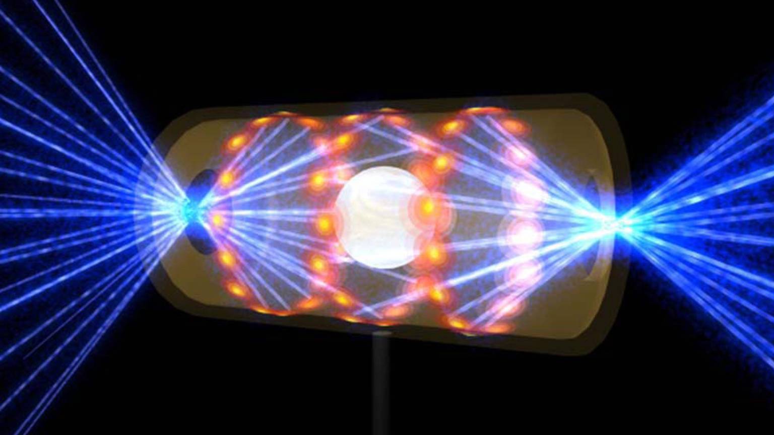 Diese Illustration zeigt ein hellleuchtendes NIF-Target-Pellet in einer gelben Hohlraumkapsel mit blauen Laserstrahlen, die durch Öffnungen an beiden Enden eintreten.
