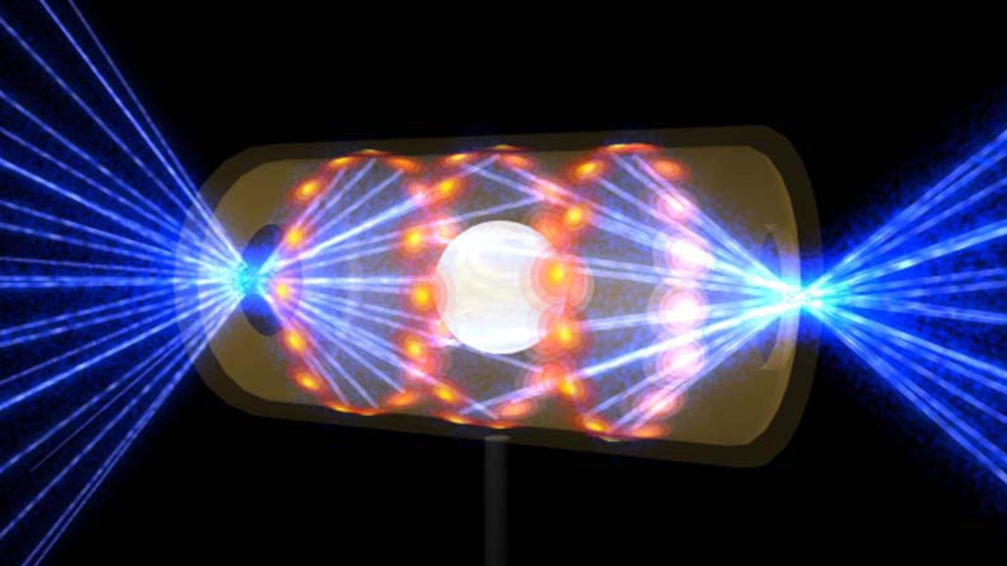Diese Illustration zeigt ein hellleuchtendes NIF-Target-Pellet in einer gelben Hohlraumkapsel mit blauen Laserstrahlen, die durch Öffnungen an beiden Enden eintreten.