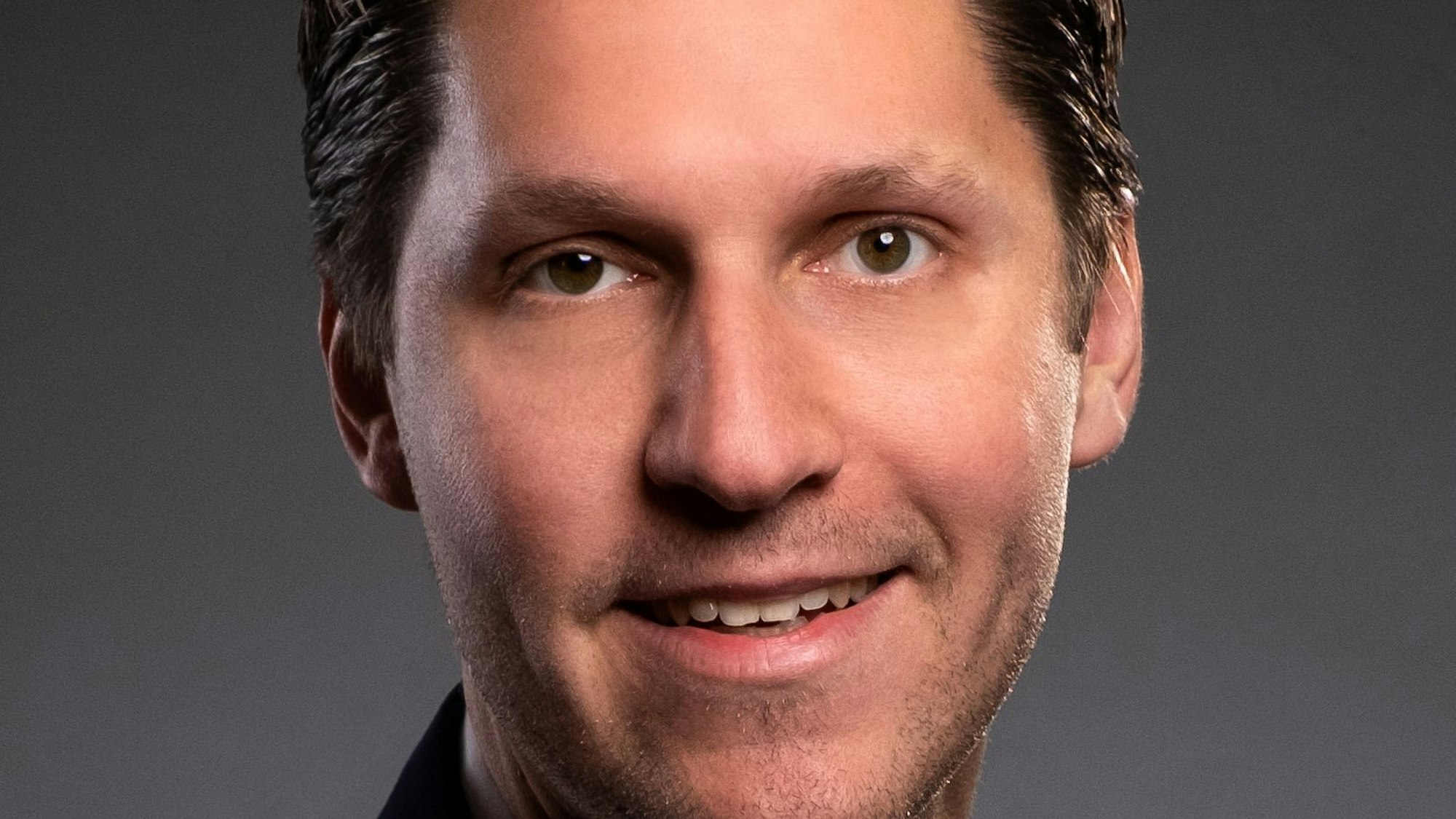 Porträt von Dominik Laufs.