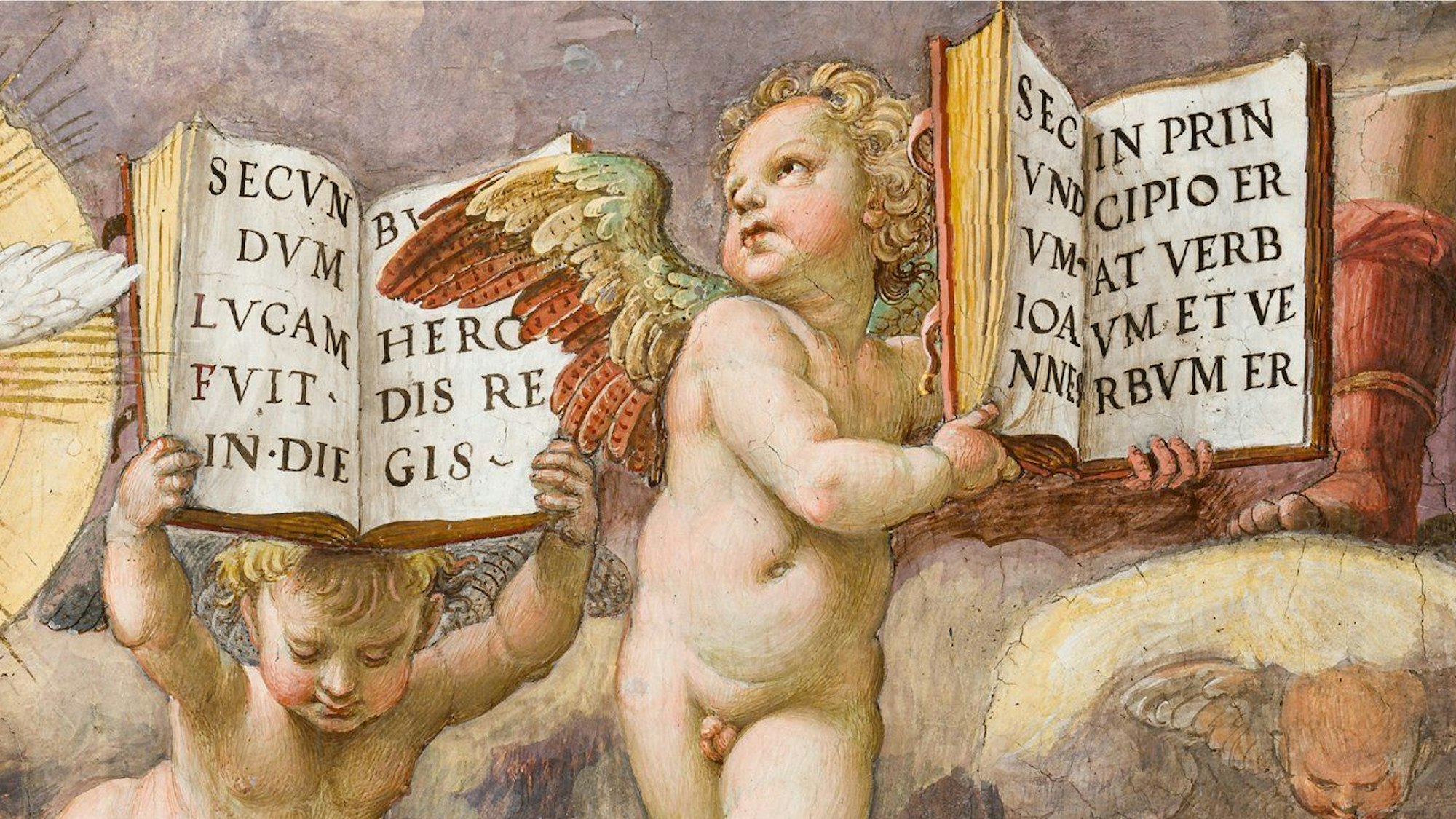 Zwei Putten halten aufgeklappte Bücher in die Luft.