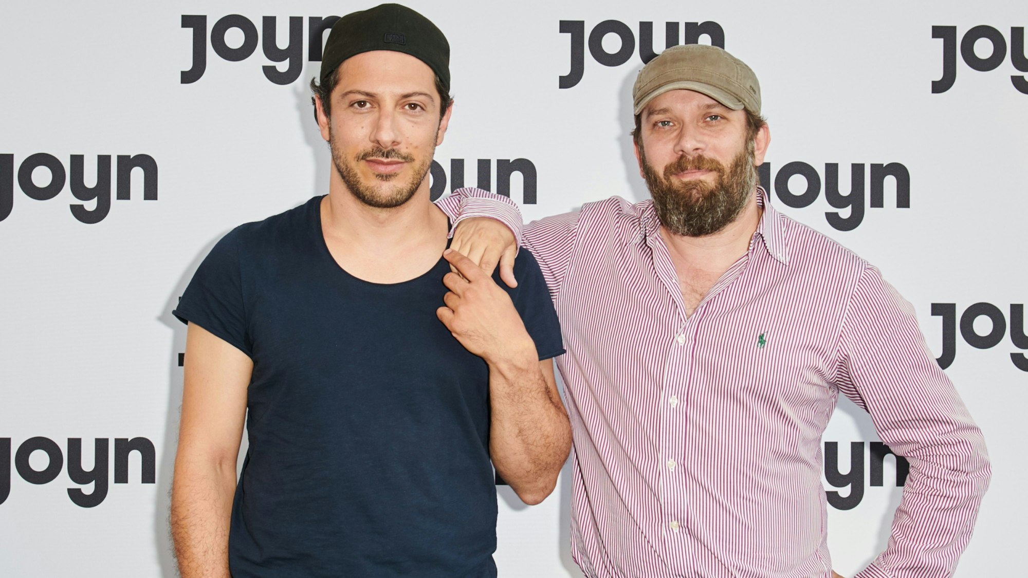 Die Schauspieler Fahri Yardim (l) und Christian Ulmen kommen ins E-Werk zum Start des Streaming-Dienstes Joyn von ProSiebenSat.1.