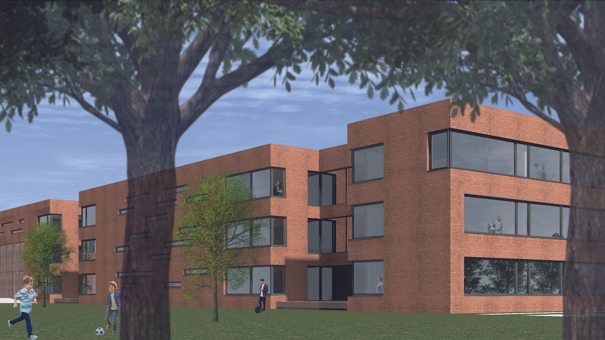 Die Visualisierung zeigt mehrere Gebäudekomplexe aus roten Steinen mit großen Fenstern.