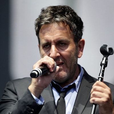 Musician Terry Hall of The Specials performs on the Main Stage, at the Isle of Wight Festival in Seaclose Park, Newport, Isle of Wight, England, on June 14, 2014. Hall, the lead singer of The Specials, died at the age of 63 following a brief illness, the band announced late Monday, Dec. 19, 2022. (Yui Mok/PA via AP)