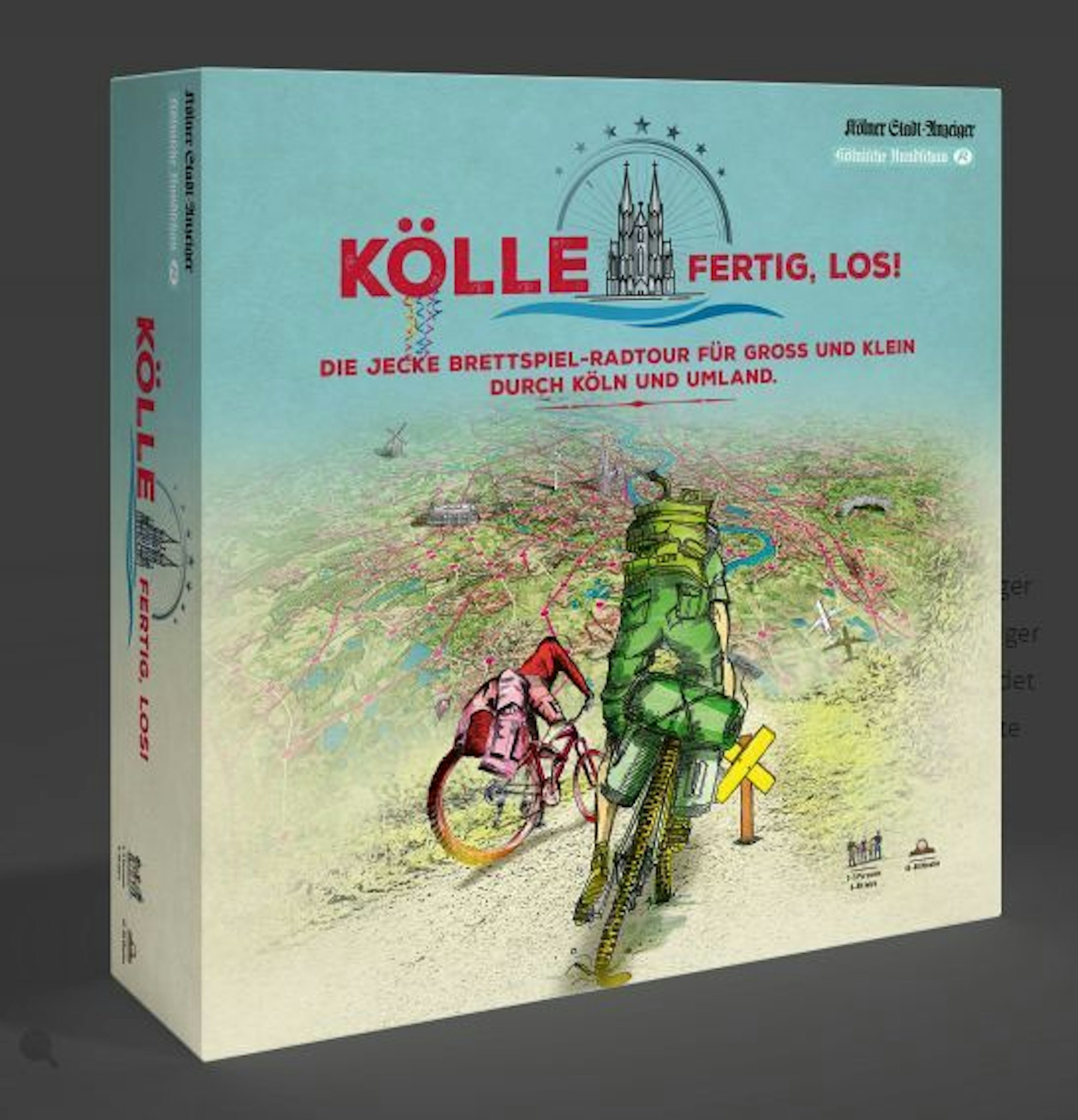 Das Spiel „Kölle, fertig, los!“ von vorne in der Verpackung.