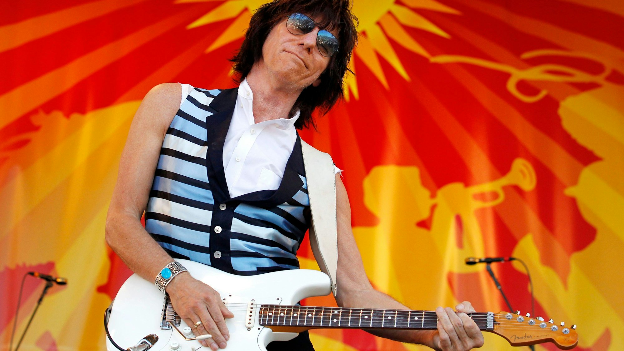 FILE - Guitarist Jeff Beck performs at the Louisiana Jazz and Heritage Festival in New Orleans on April 29, 2011. Beck, a guitar virtuoso who pushed the boundaries of blues, jazz and rock ‘n’ roll, influencing generations of shredders along the way and becoming known as the guitar player’s guitar player, died Tuesday, Jan. 10, 2023, after “suddenly contracting bacterial meningitis,” his representatives said in a statement released Wednesday. He was 78. (AP Photo/Gerald Herbert, File)