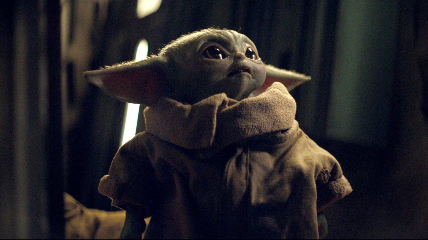 Auch jetzt wieder dabei: Baby Yoda in einer Szene aus „The Mandalorian“.