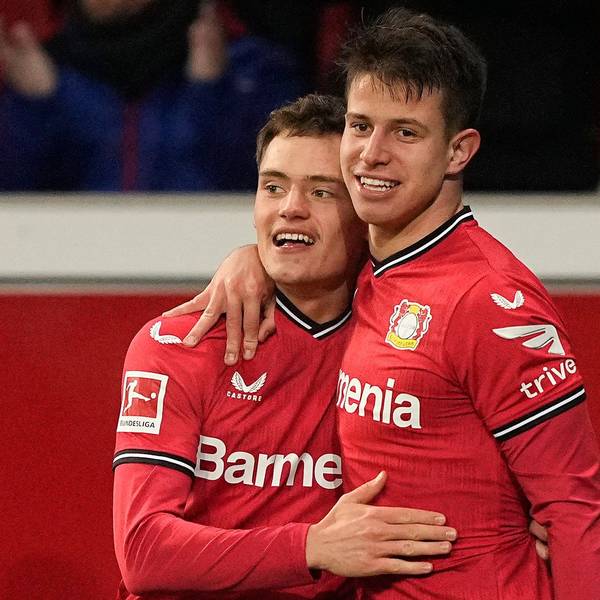 Leverkusen's Adam Hlozak, right, celebrates with Leverkusen's Florian Wirtz after scoring his side's second goal during the German Bundesliga soccer match between Bayer Leverkusen and VfL Bochum in Leverkusen, Germany, Germany, Wednesday, Jan. 25, 2023. (AP Photo/Martin Meissner)