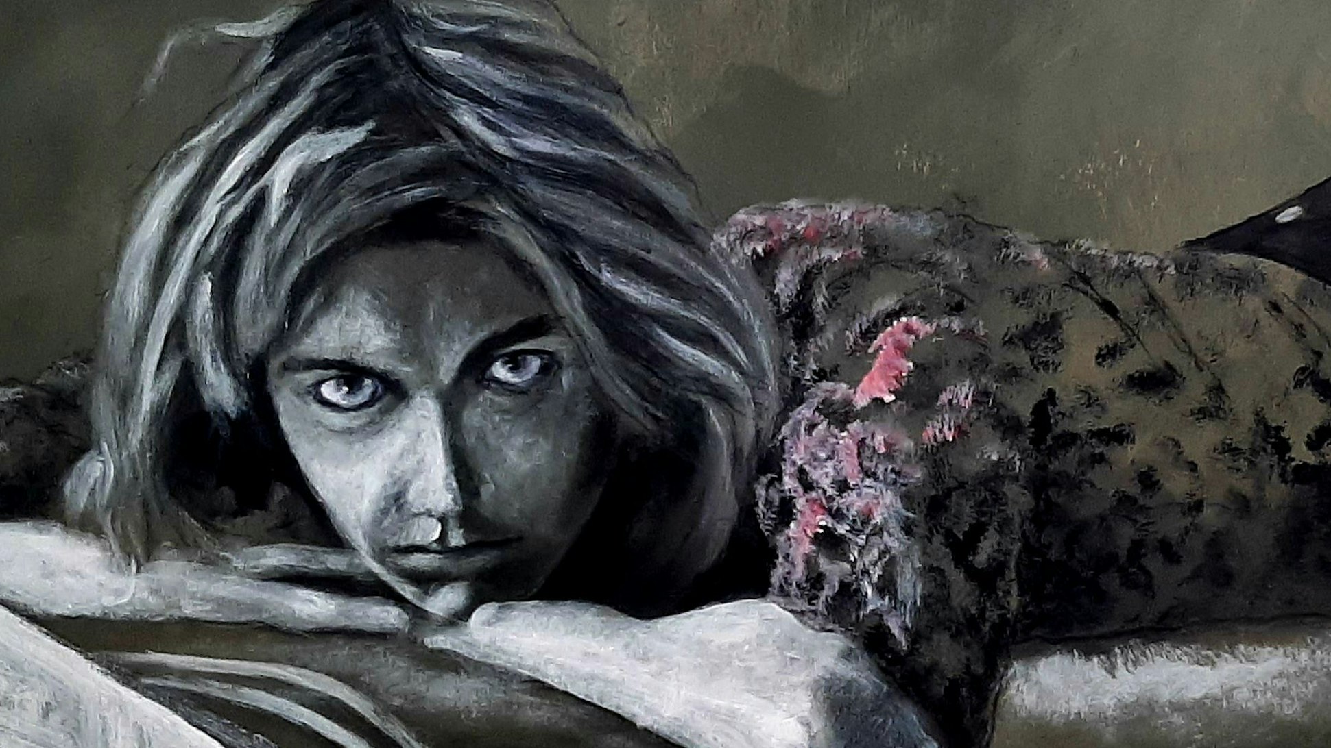 Bild mit liegender Frau.