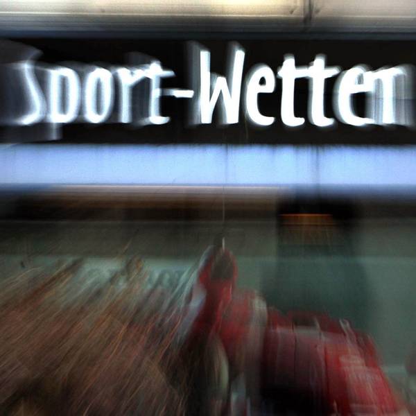 Ein Schild mit der Aufschrift „Sport-Wetten“.