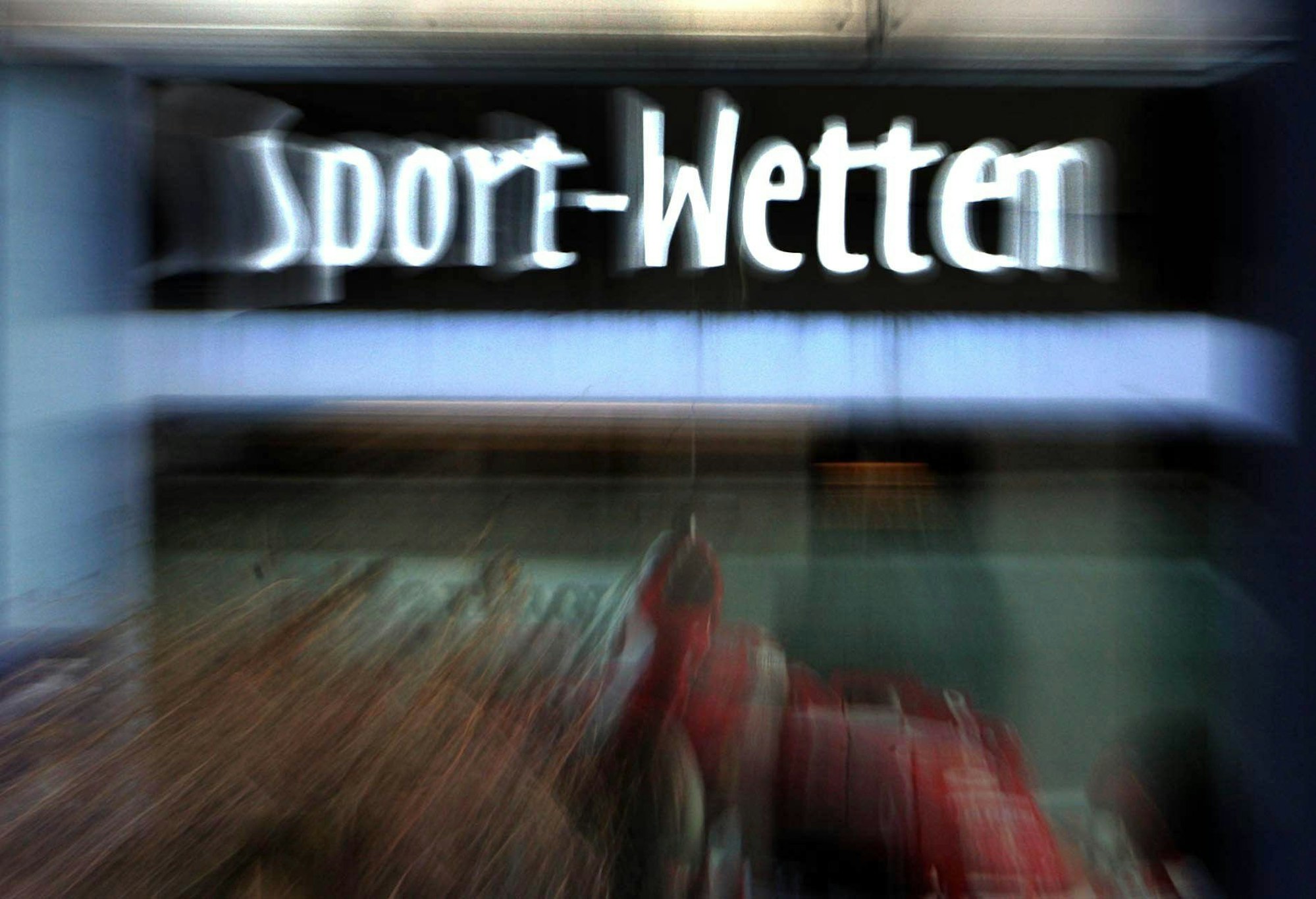 Ein Schild mit der Aufschrift „Sport-Wetten“.