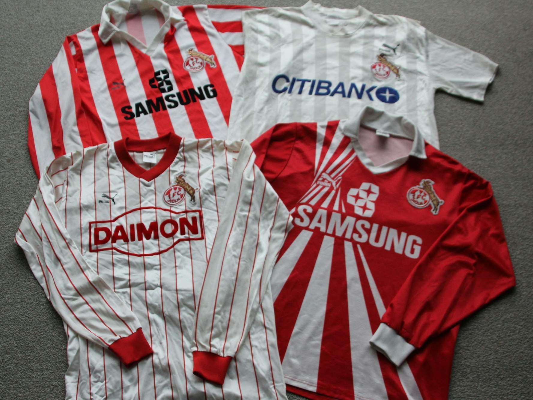 Vier Trikots des 1. FC Köln des Herstellers Puma, die nur selten zu haben sind und entsprechend teuer sind.
