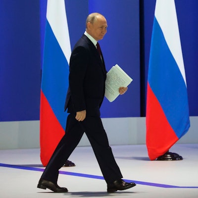 Russian President Vladimir Putin arrives to give his annual state of the nation address in Moscow, Russia, Tuesday, Feb. 21, 2023. (Sergei Karpukhin, Sputnik, Kremlin Pool Photo via AP)
