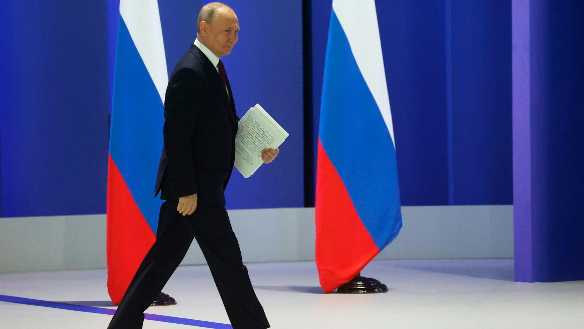 Russian President Vladimir Putin arrives to give his annual state of the nation address in Moscow, Russia, Tuesday, Feb. 21, 2023. (Sergei Karpukhin, Sputnik, Kremlin Pool Photo via AP)