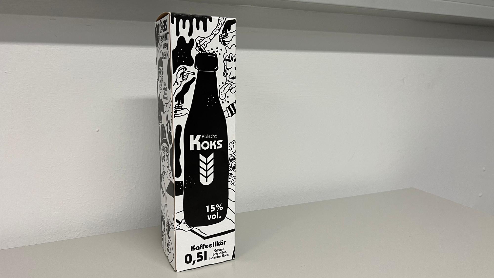 Eine schwarz-weiße Verpackung steht auf einem Tisch.