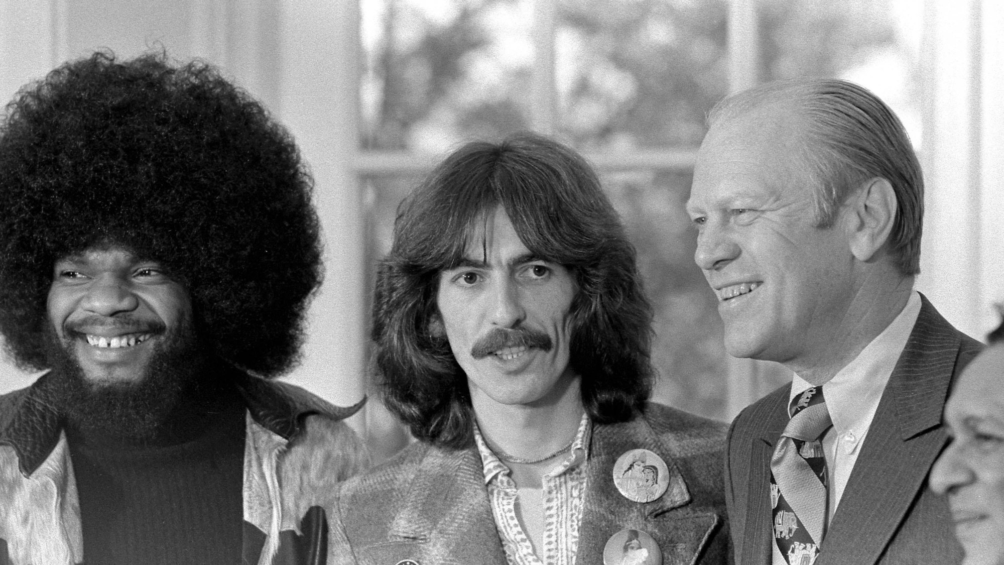Gerald R. Ford mit George Harrison und Billy Preston im Oval Office des Weißen Hauses.