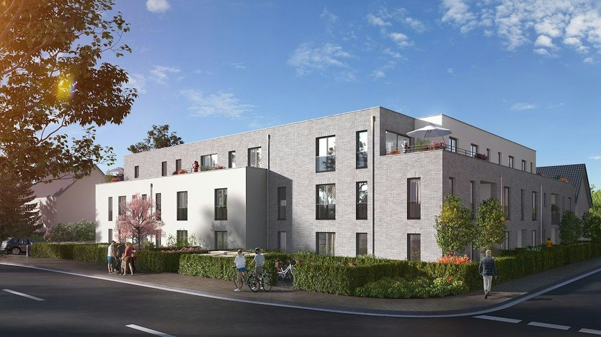 Ein Haus-Neubau steht an einer Straßenecke.