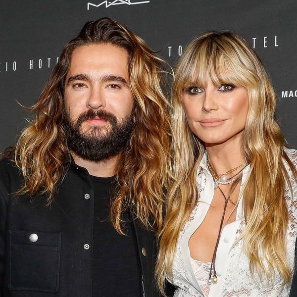 Bill Kaulitz, Tom Kaulitz und Heidi Klum posieren für Fotografen.