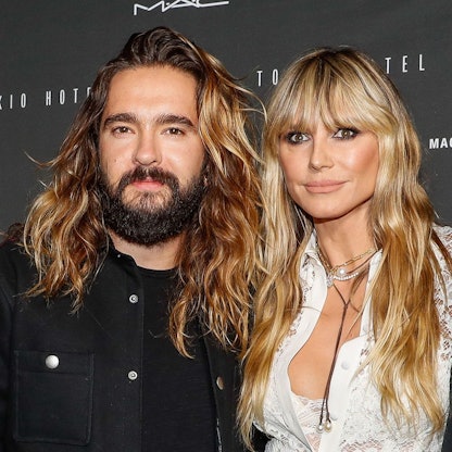 Bill Kaulitz, Tom Kaulitz und Heidi Klum posieren für Fotografen.