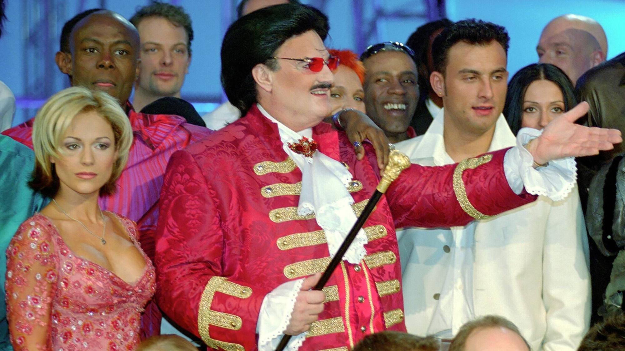 Schlagerstar Michelle, Rudolph Moshammer und Zlatko posieren.