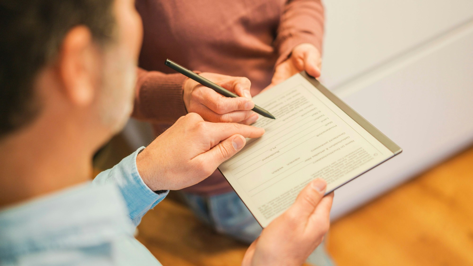 Salesman assisting customer filling form model released, Symbolfoto property released, JOSEF16734