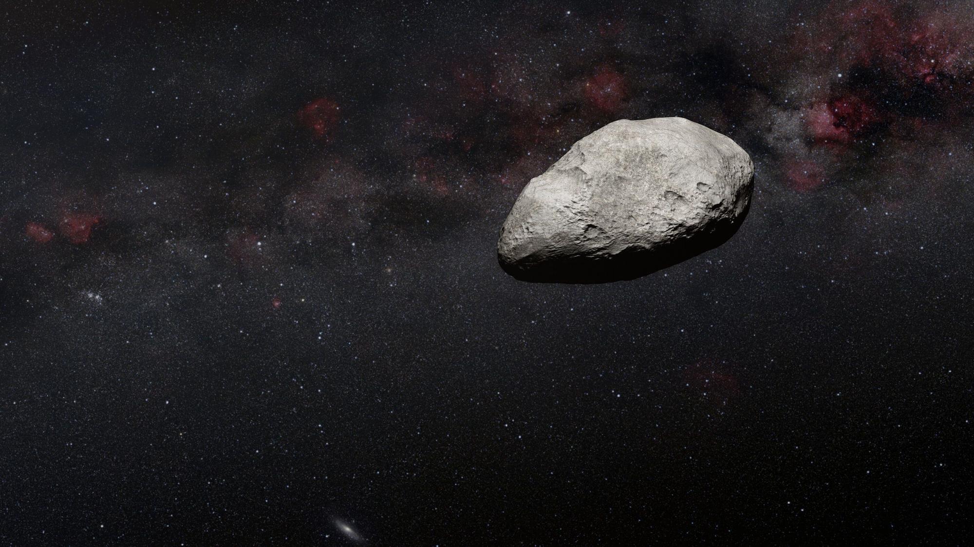 Ein Asteroid im Weltraum nähert sich der Erde.