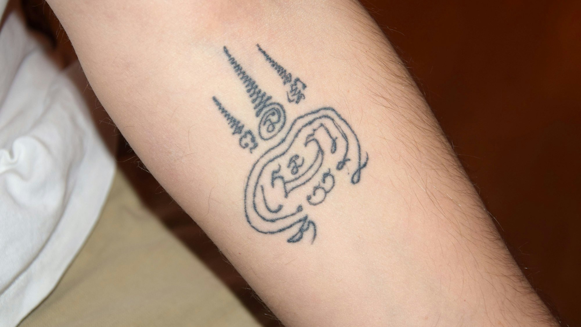 Das Foto zeigt ein Tattoo auf dem Arm von David Leischik