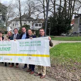 Veranstaltergemeinschaft der Umweltwoche Burscheid mit Banner