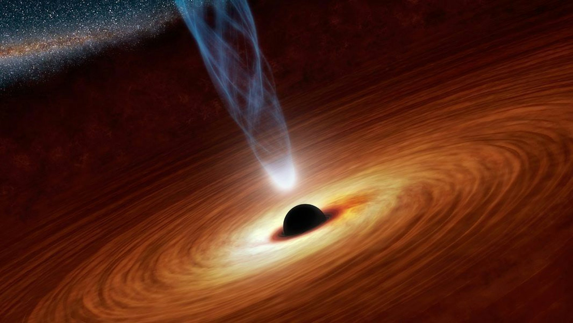 Eine Illustration der US-Raumfahrtbehörde Nasa zeigt ein supermassereiches Schwarzes Loch. Britische Forscher entdeckten nun eines der bisher größten bekannten Schwarzen Löcher. (Archivbild)