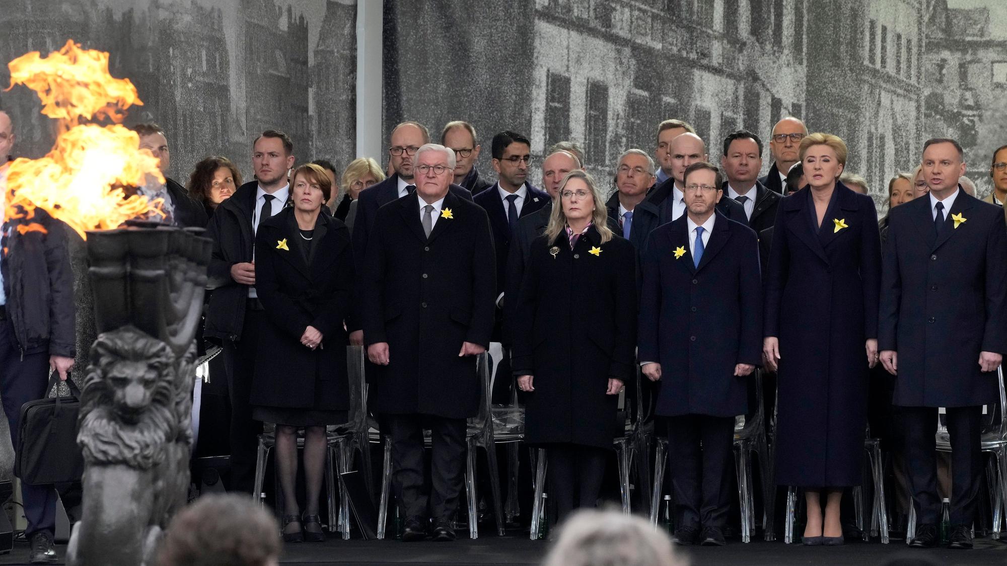 Front from right, Polish President Andrzej Duda, Agata Kornhauser-Duda, Israel's President Isaac Herzog, Michal Herzog, German President Frank-Walter Steinmeier and Elke Buedenbender attend a 'Warsaw Ghetto Uprising' commemoration reception in Warsaw, Poland, Wednesday, April 19, 2023. Presidents and Holocaust survivors and their descendants are marking the 80th anniversary of the Warsaw Ghetto Uprising. The anniversary honors the hundreds of young Jews who took up arms in Warsaw in 1943 against the overwhelming might of the Nazi German army. (AP Photo/Czarek Sokolowski)