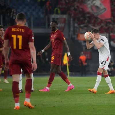 Leverkusen's Florian Wirtz, center, reacts during the Europa League semifinal first leg soccer match between Roma and Bayer 04 Leverkusen at Rome's Olympic stadium, Thursday, May 11, 2023. (AP Photo/Gregorio Borgia)