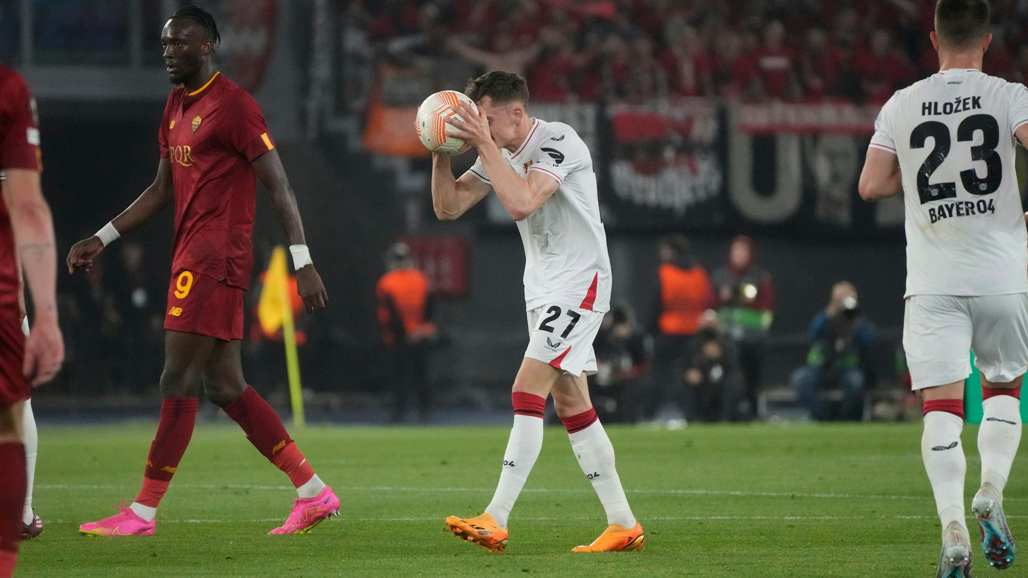 Leverkusen's Florian Wirtz, center, reacts during the Europa League semifinal first leg soccer match between Roma and Bayer 04 Leverkusen at Rome's Olympic stadium, Thursday, May 11, 2023. (AP Photo/Gregorio Borgia)
