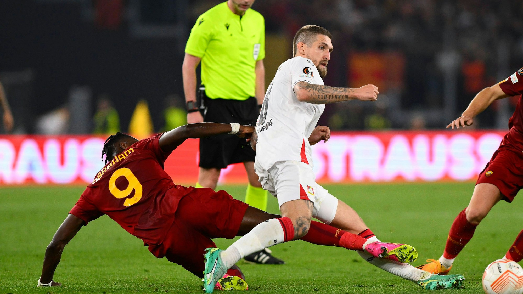 Tammy Abraham of A.S. Roma and Robert Andrich of Bayer 04 Leverkusen.