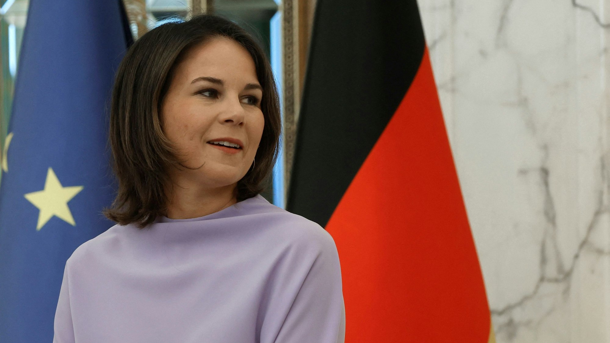 German Foreign Minister Annalena Baerbock attends a joint press conference with her Qatari counterpart in Doha on May 17, 2023. (Photo by KARIM JAAFAR / AFP)