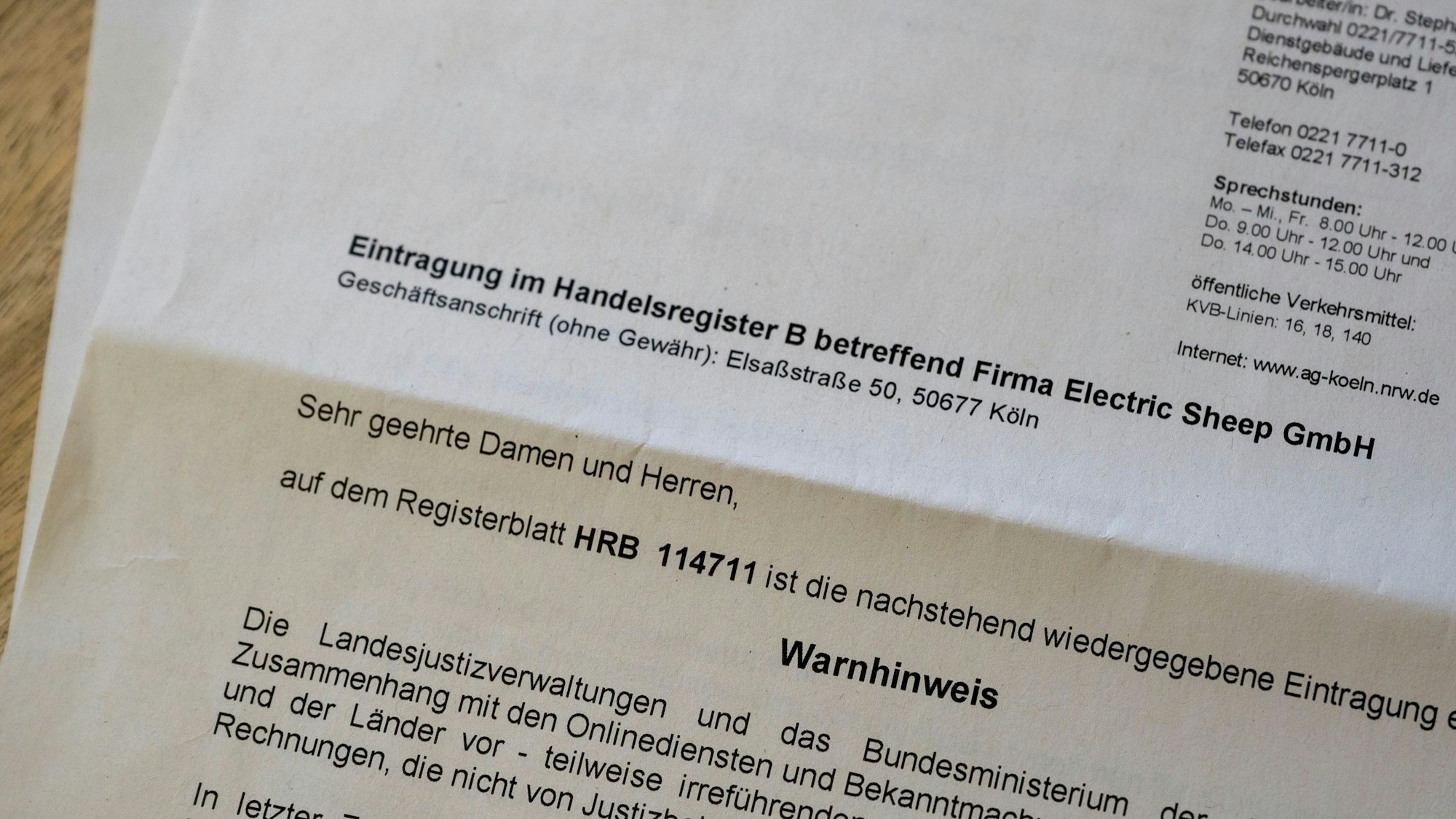 Das Schreiben des Amtsgerichts, in dem die Handelsregisternummer 114711 mitgeteilt wurde.