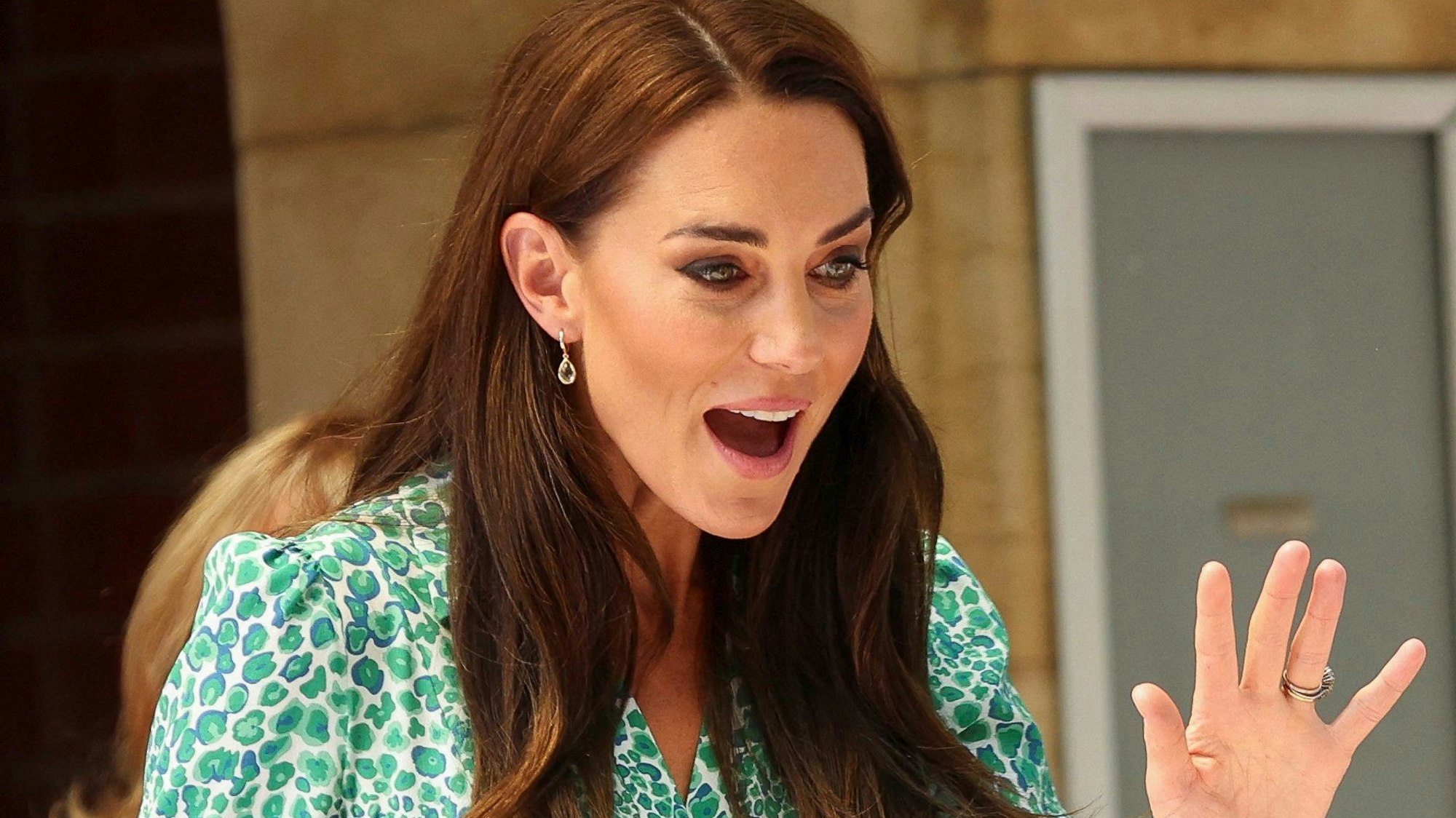 Britain's Kate, Princess of Wales, waves as she leaves Riversley Park Children's Centre in Nuneaton, England, Thursday June 15, 2023. . (Phil Noble, Pool via AP)