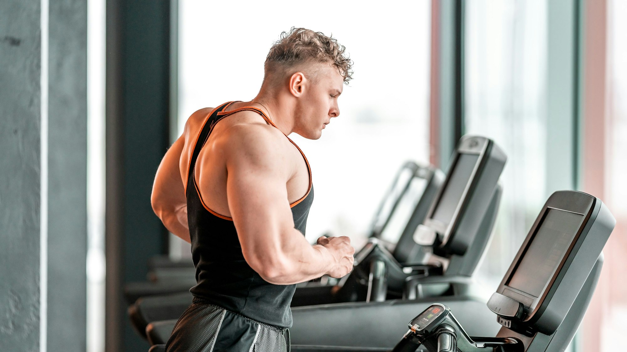 athlete on a treadmill in the gym