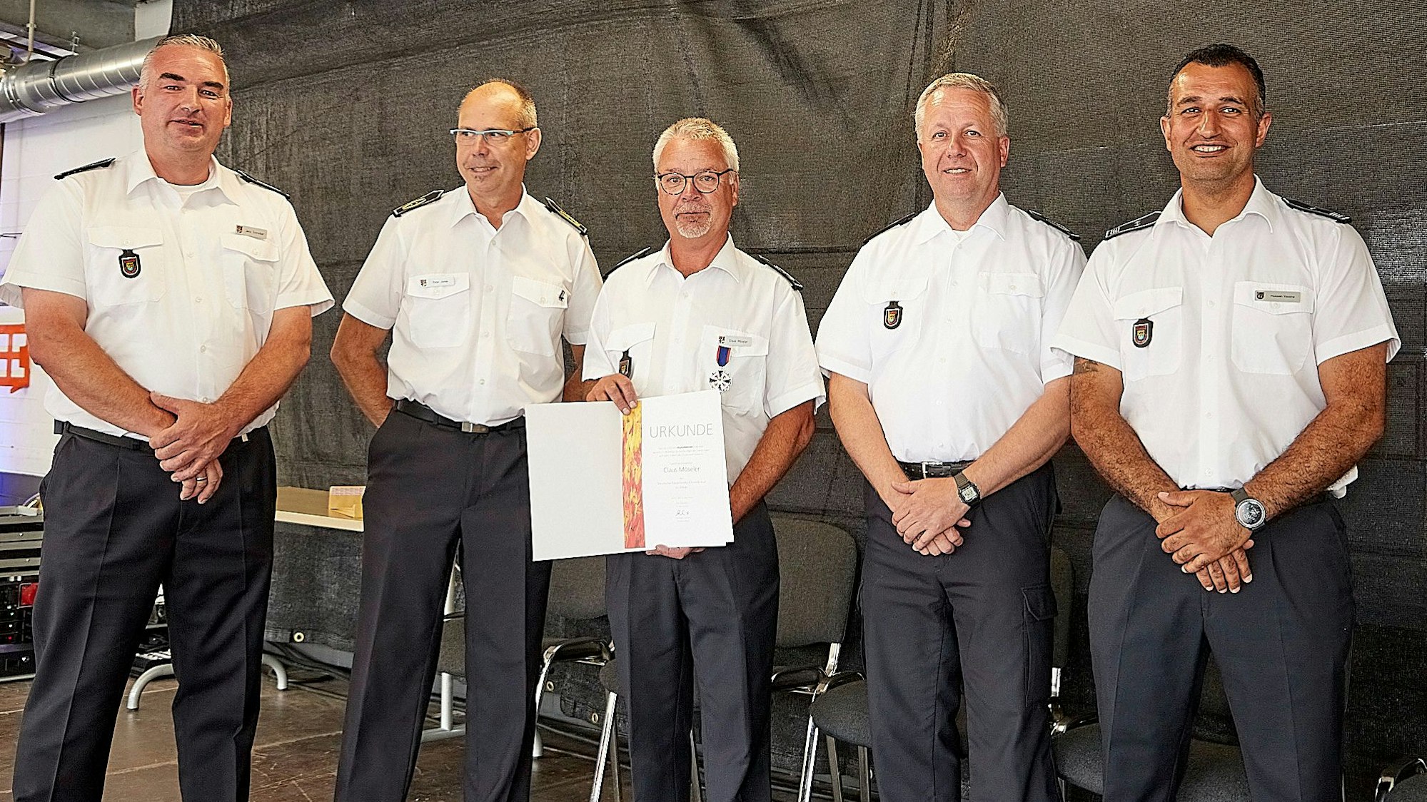 Jens Schreiber (v.l.), Peter Jonas, Claus Möseler, Thomas Wolff, Hussein Yassine haben sich zu einem Foto aufgestellt.