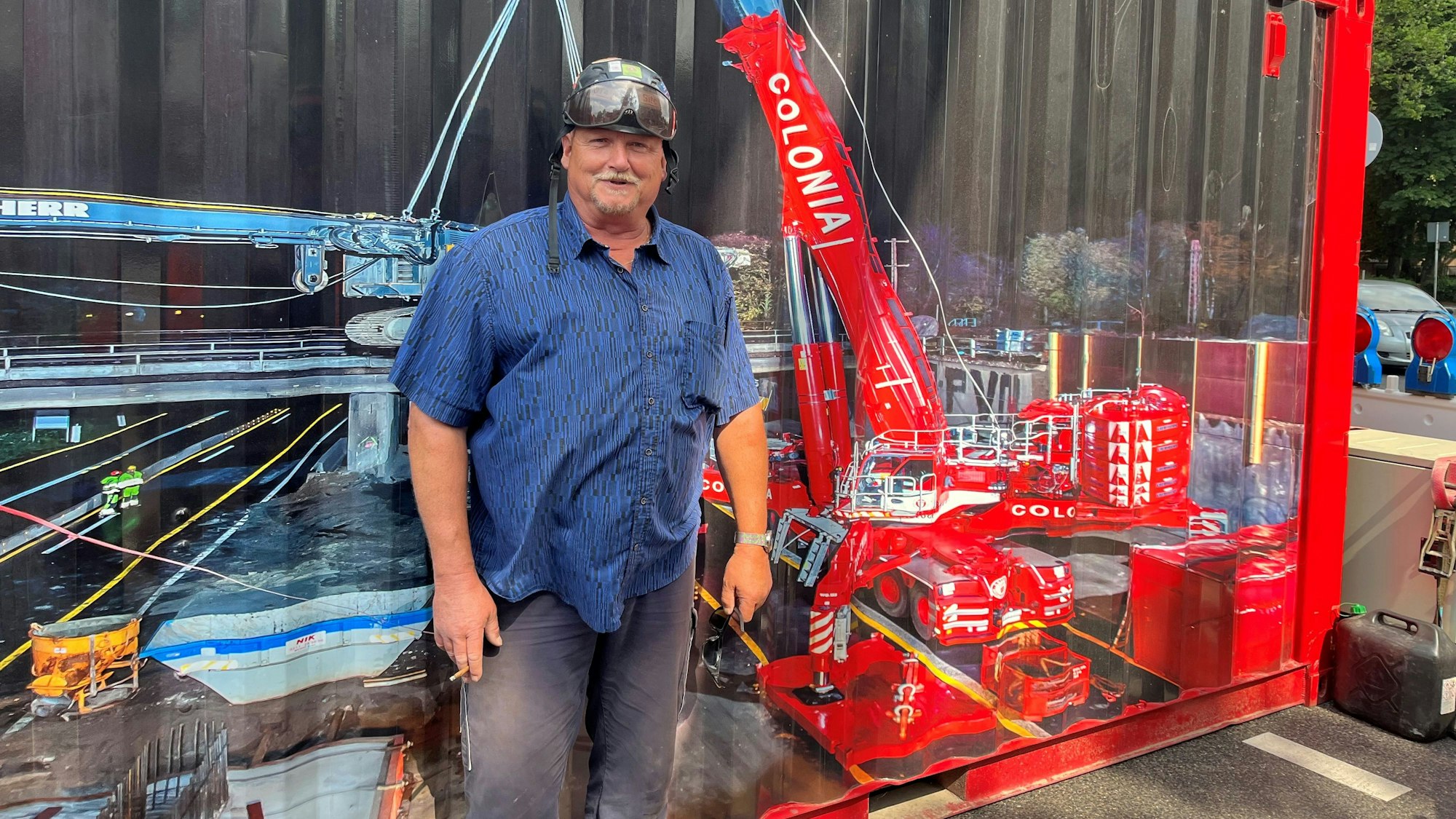 Das Bild zeigt Kranführer Peter Rother.