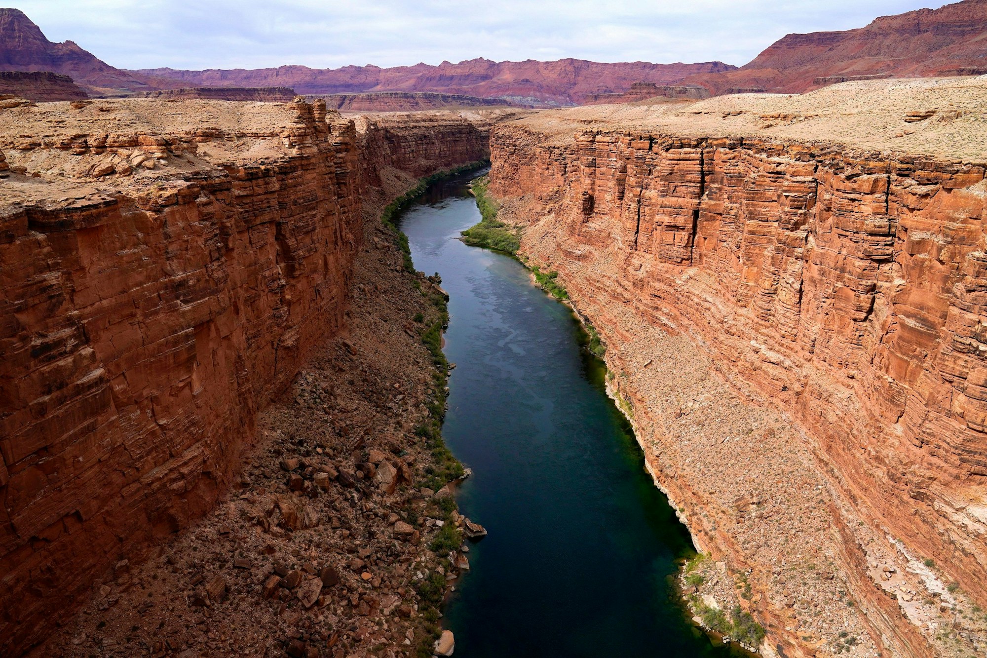 FILE - The Colorado River in the upper River Basin is pictured in Lees Ferry, Ariz., on May 29, 2021. The Supreme Court has ruled against the Navajo Nation in a dispute involving water from the drought-stricken Colorado River. States that draw water from the river — Arizona, Nevada and Colorado — and water districts in California had urged the court to decide for them, and that's what the justices did in a 5-4 ruling. (AP Photo/Ross D. Franklin, File)