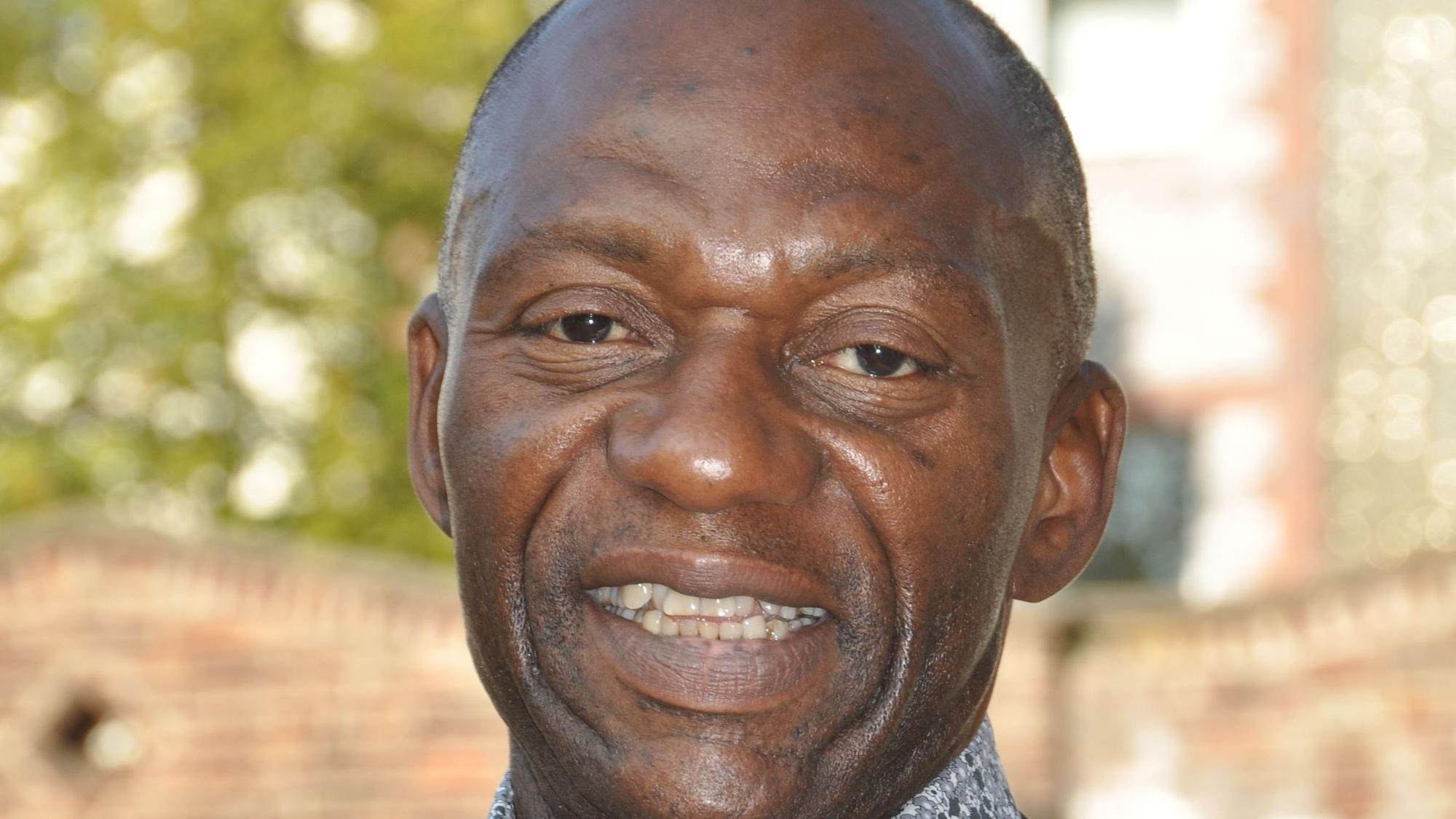 John Akude.