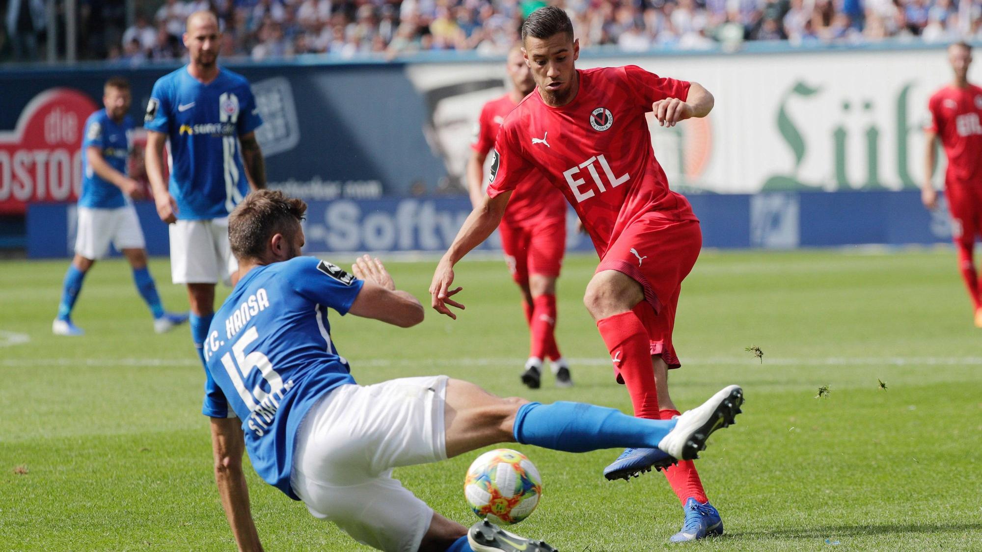 20.07.2019- 3.Liga 2019/2020: FC Hansa Rostock vs. Viktoria Koeln - rechts Suheyel Najar (Koeln) gegen links Adam Straith (Rostock) --- DFB regulations prohibit any use of photographs as image sequences and/or quasi-video