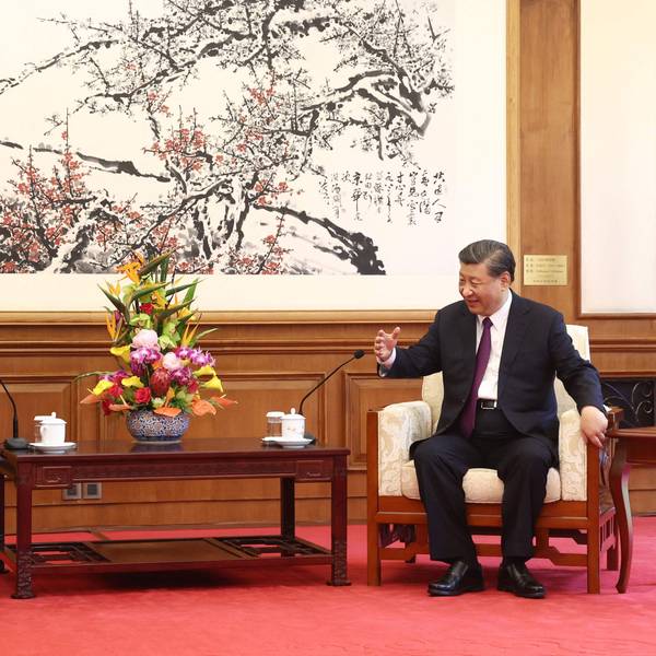 China's President Xi Jinping (R) speaks with former US secretary of state Henry Kissinger during a meeting in Beijing on July 20, 2023. (Photo by CNS / AFP) / China OUT