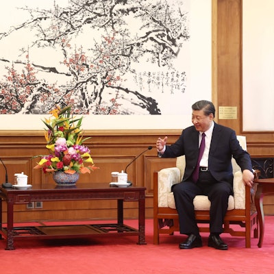China's President Xi Jinping (R) speaks with former US secretary of state Henry Kissinger during a meeting in Beijing on July 20, 2023. (Photo by CNS / AFP) / China OUT