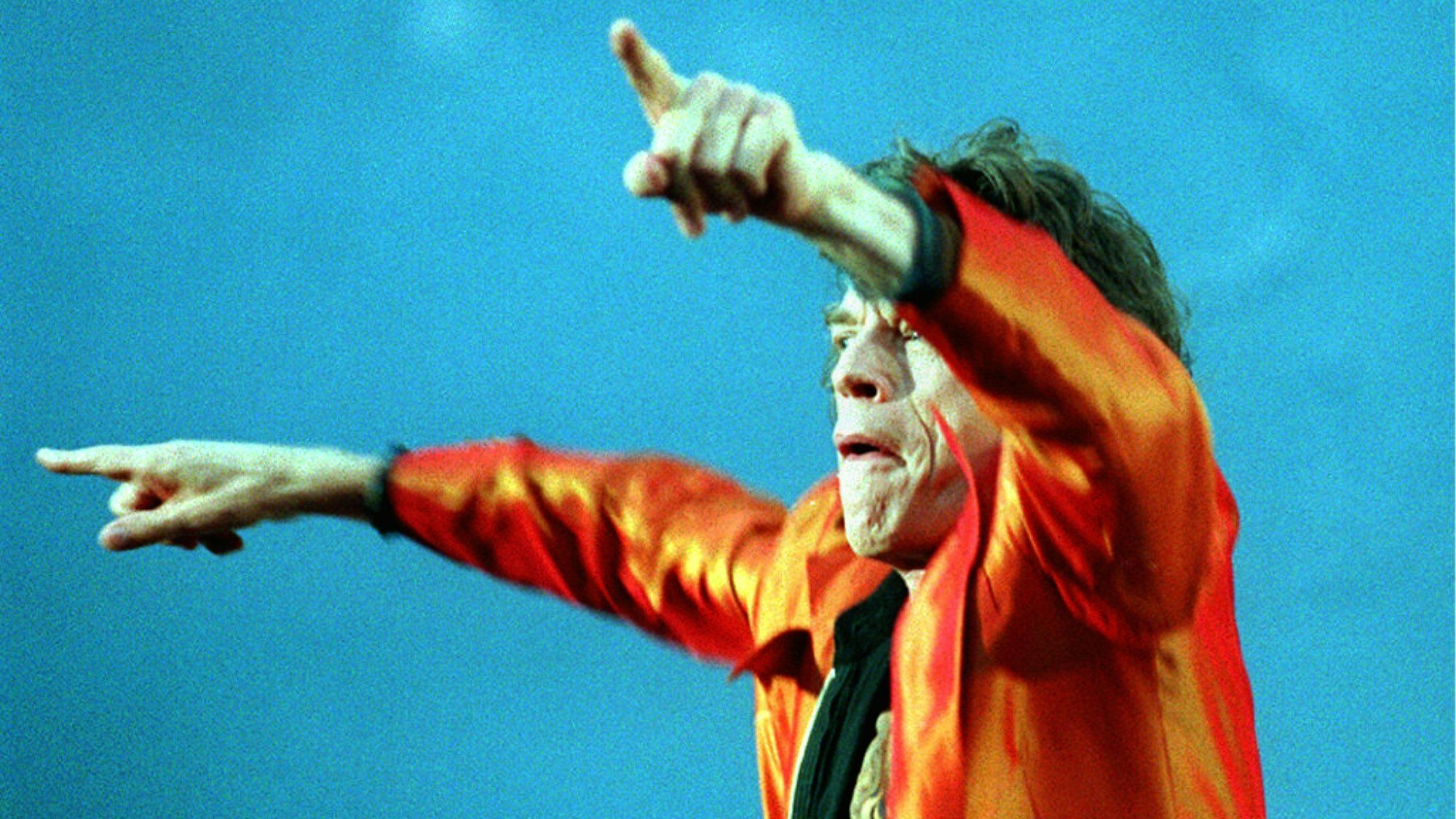 Eine Nahaufnahme von Mick Jagger auf der Bühne.